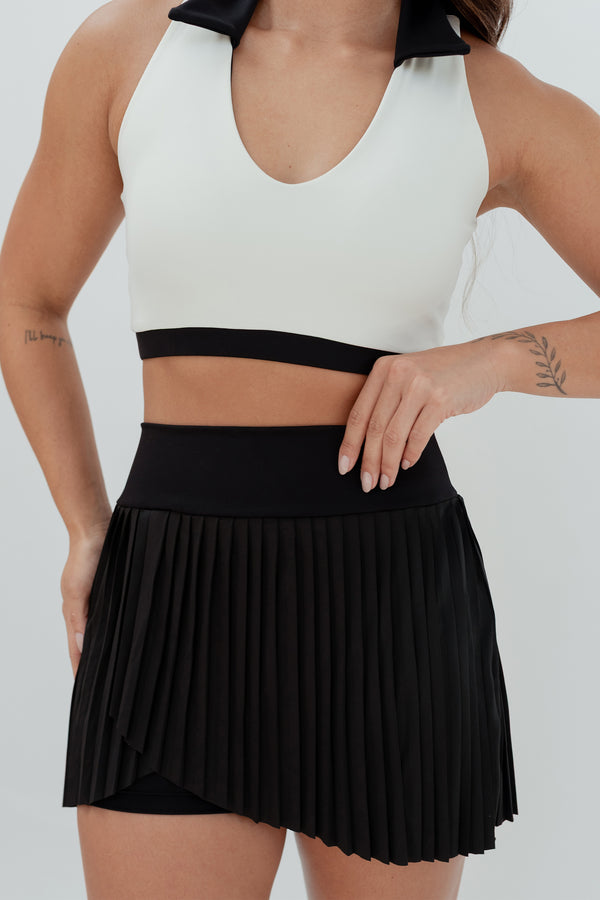 Shorts Saia Versa Plissada com Bolsos e Cós Alto
