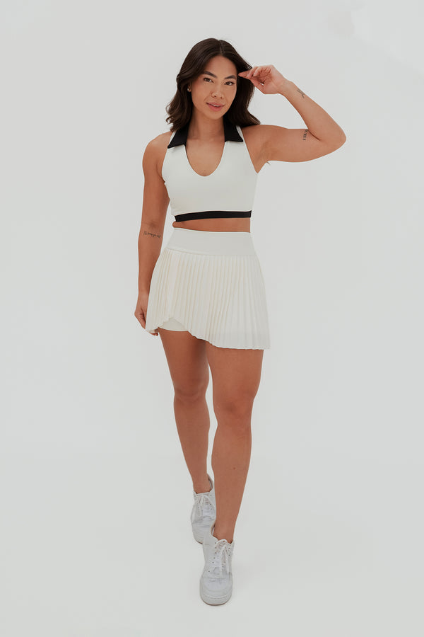 Shorts Saia Versa Plissada com Bolsos e Cós Alto