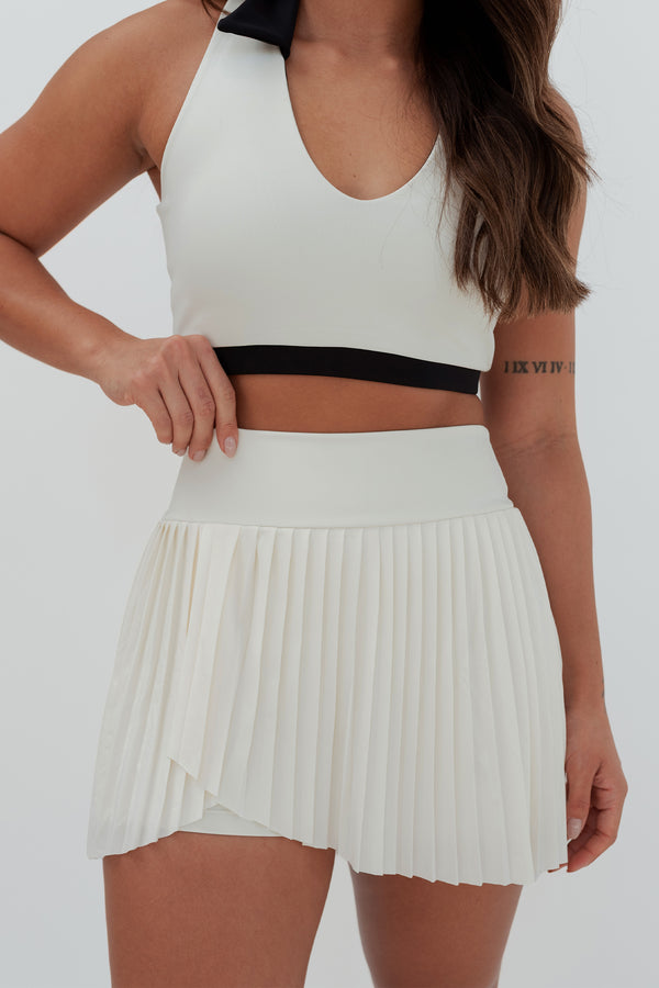 Shorts Saia Versa Plissada com Bolsos e Cós Alto